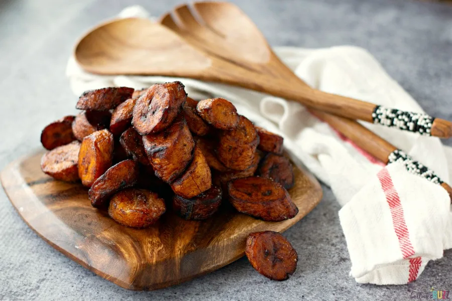 sliced Sweet Fried Plantains with serving spoons