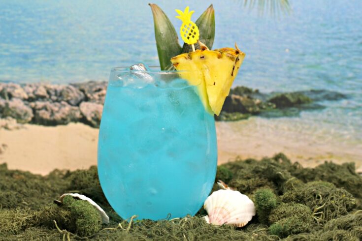 Sparkling blue, fruity summer cocktail recipe for Blue Hawaiian