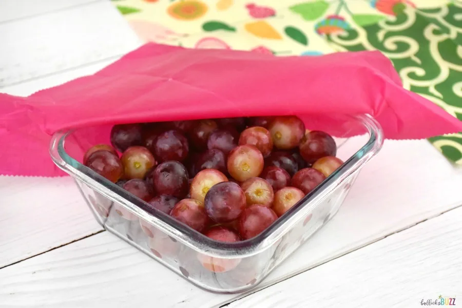 bowl of grapes covered with a wrap