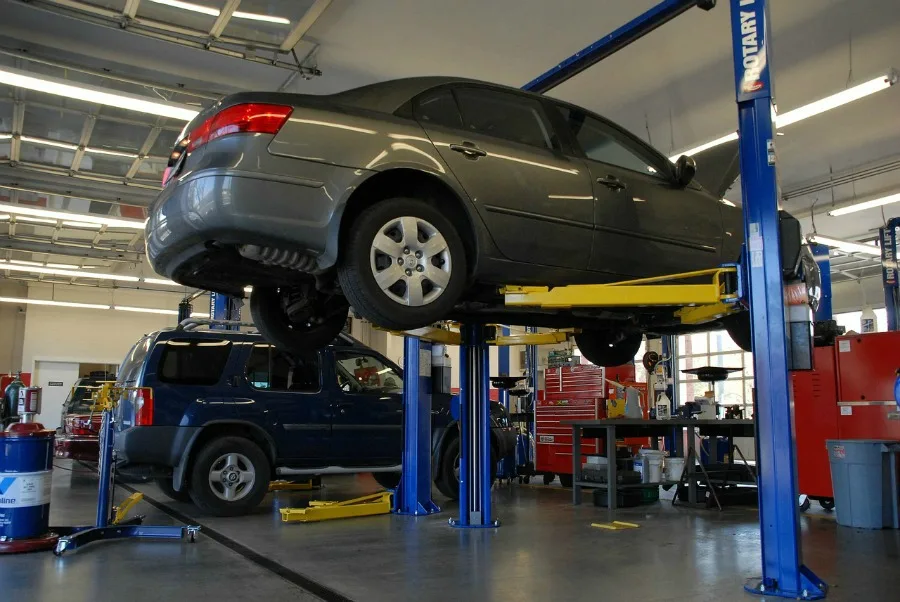 car on rack at shop