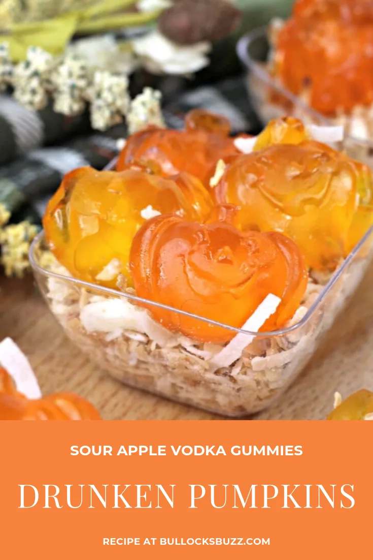 These Drunken Pumpkin Sour Apple Vodka Gummies are the perfect adult-only Fall or Halloween candy treat! Gummy pumpkins are infused with Sour Apple Vodka and served over a bed of sweet toasted coconut in this easy vodka gummies recipe. #Halloweenrecipe #Fallrecipe #vodkagummies