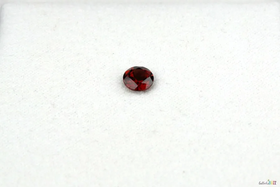 loose garnet included with ring