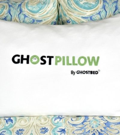 GhostPillow faux down pillow on bed