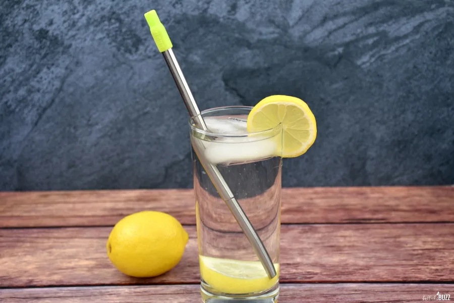 eco-friendly Zoku reusable straw in glass of water