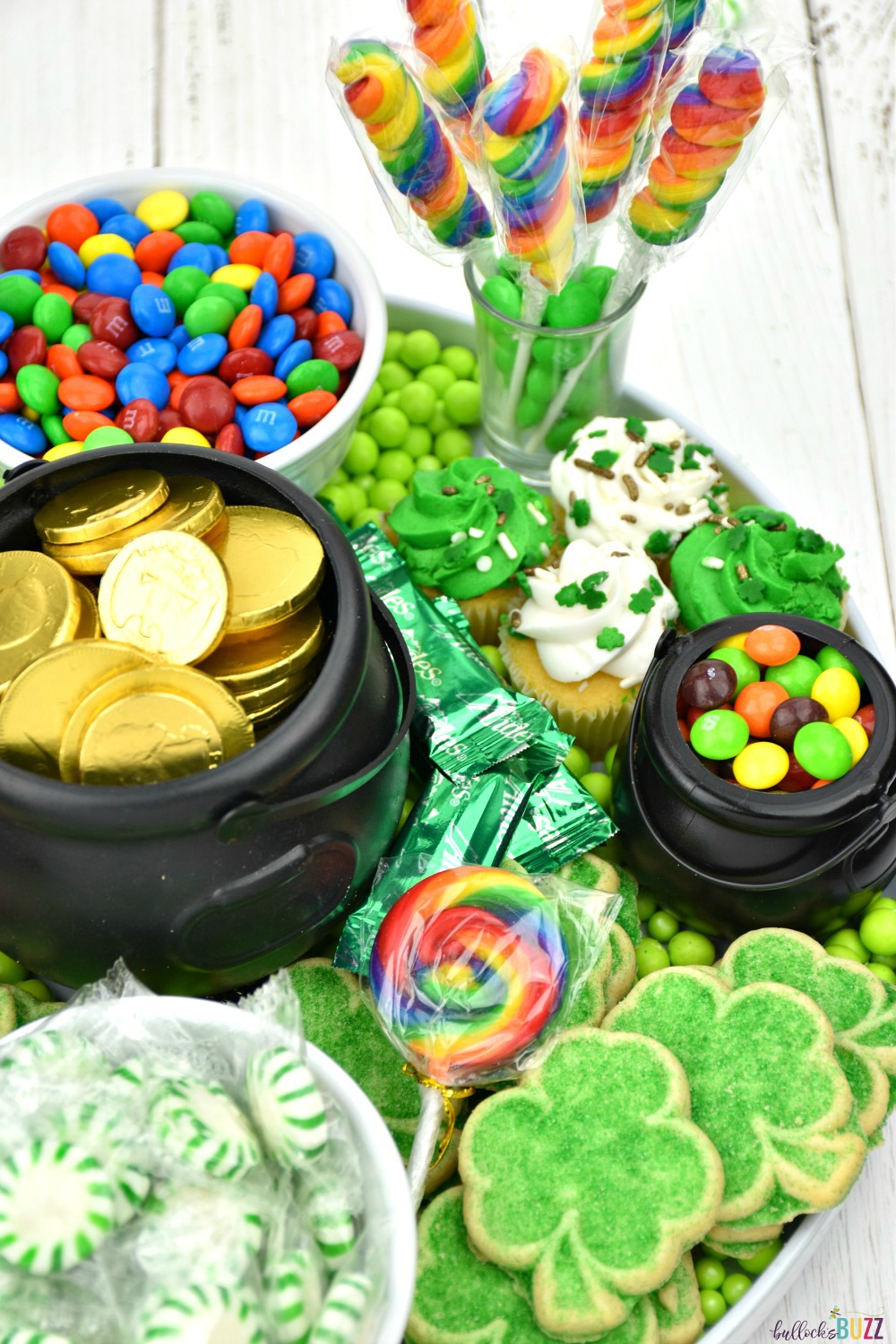 With shamrocks, rainbows, and even a pot of gold, this bright and colorful Dessert Charcuterie Board for St. Patrick's Day is SO much tasty fun! #stpatricksday #recipe #charcuterieboard