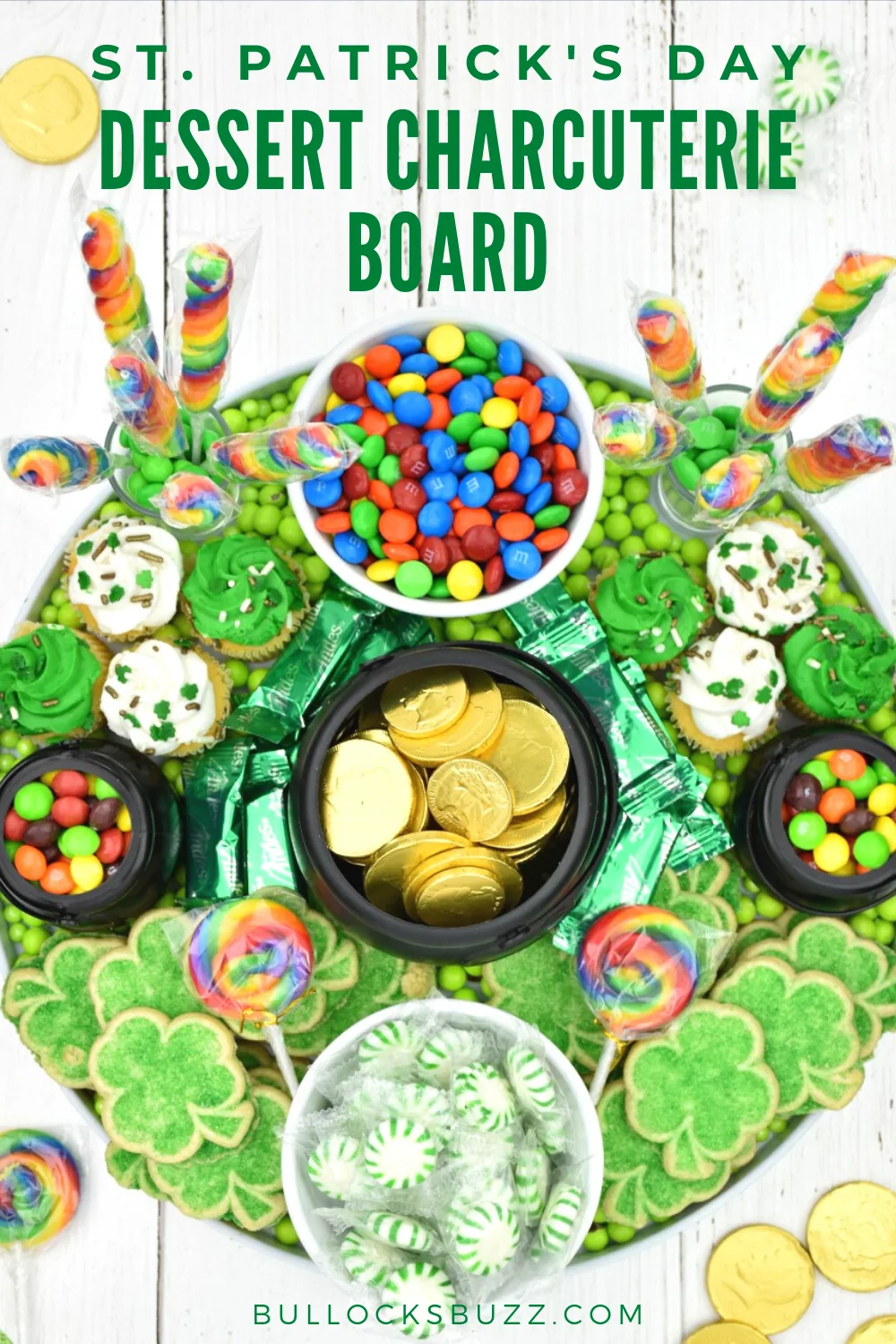 This eye-catching Dessert Charcuterie Board for St. Patrick's Day is SO much tasty fun! From shamrocks to rainbows plus a pot of gold, this colorful sweet treat has it all! #stpatricksday #recipe #charcuterieboard
