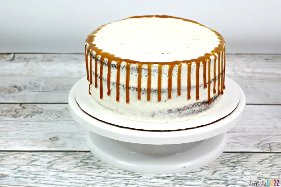 drizzle caramel sauce down sides of cake