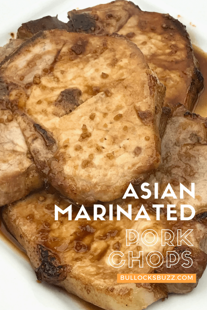 These Asian Marinated Pork Chops are infused with the yummiest marinade that takes both sweet and salty flavors and combines them into one deliciously bold taste. The result is a juicy, tender, and amazingly flavorful pork chop dinner that takes very little effort. #recipe #dinnerrecipe #porkchops