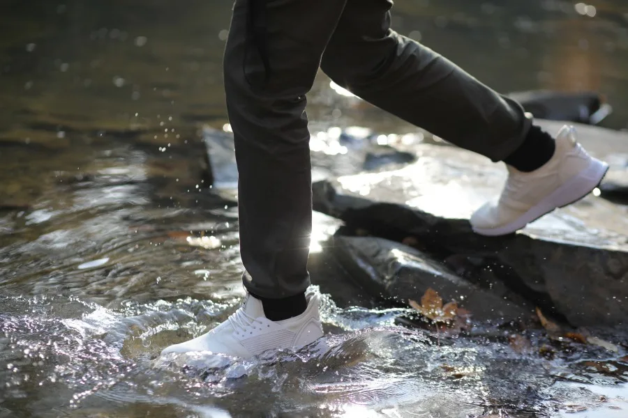 walking through water in loom sneakers
