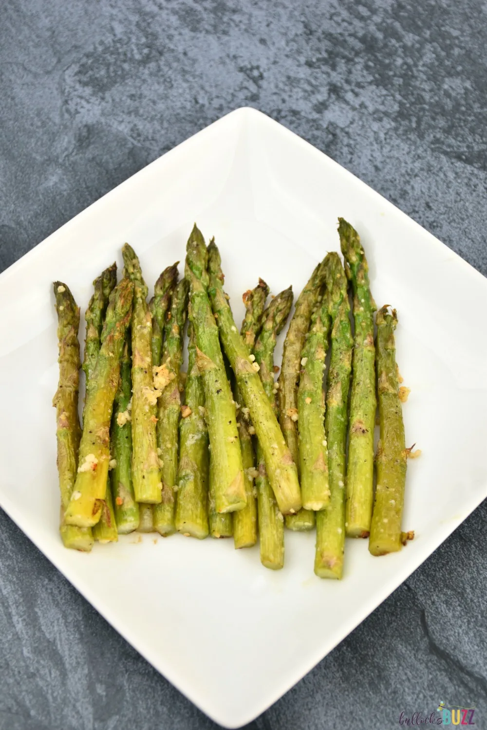 Tender spears of asparagus are seasoned and roasted to perfection in this quick and easy Oven Roasted Asparagus recipe.