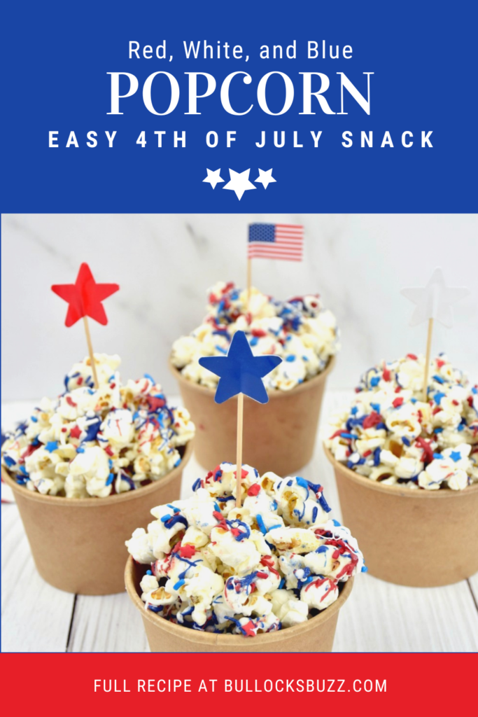 Red, white, and blue patriotic popcorn topped with candy melts and festive sprinkles served in individual cups with star picks and an American flag. Easy sweet and salty 4th of July snack recipe for parties and cookouts.