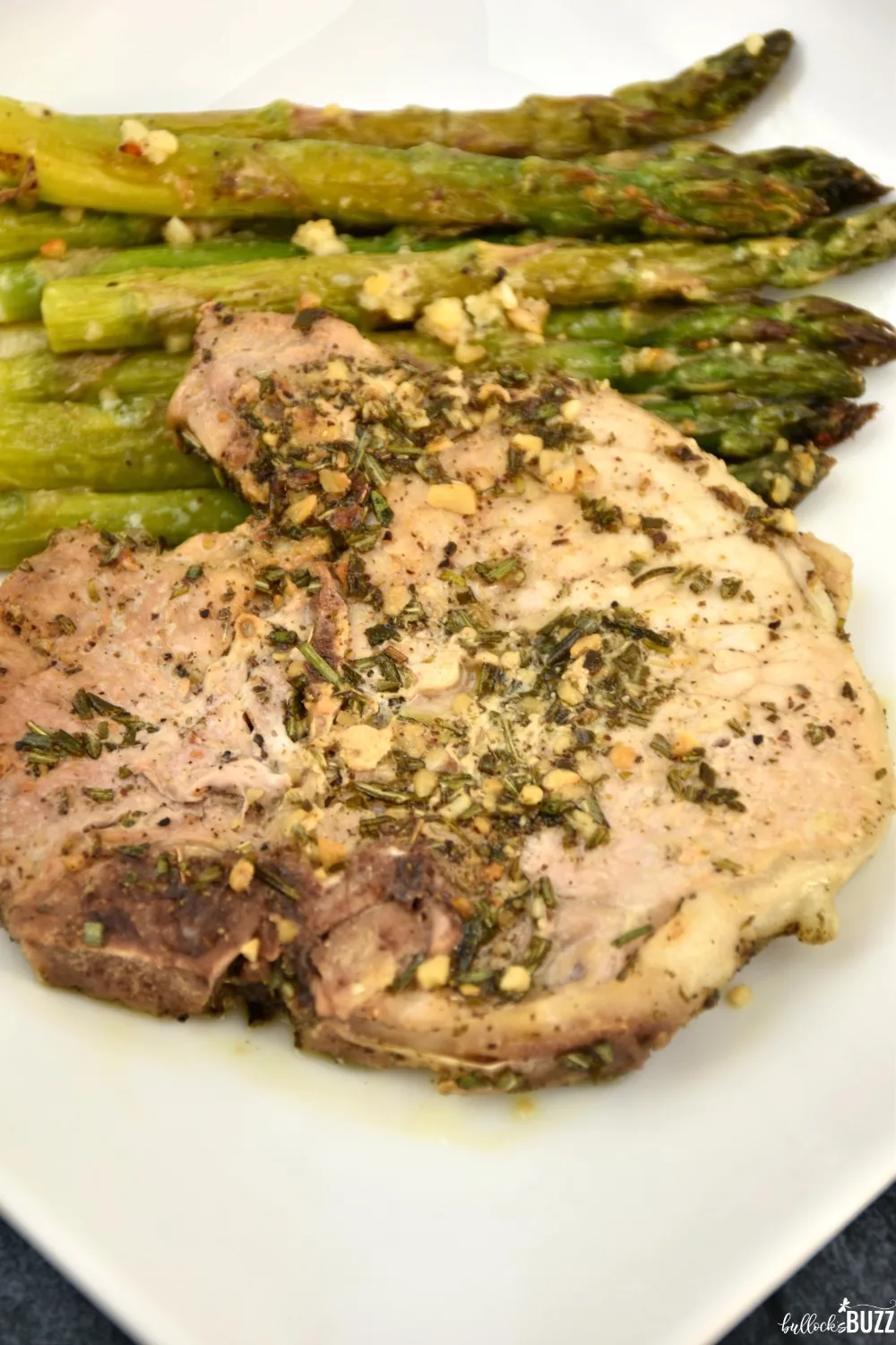 It really doesn't get any easier than this Rosemary Sage Pork Chop dinner recipe. Simply sauté the herbs in olive oil. Add in the pork chops. And cook until they're ready. That’s it. You’re done!