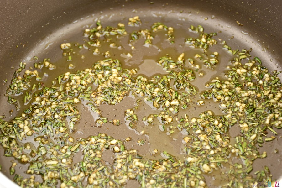 fresh herbs sauteing in olive oil