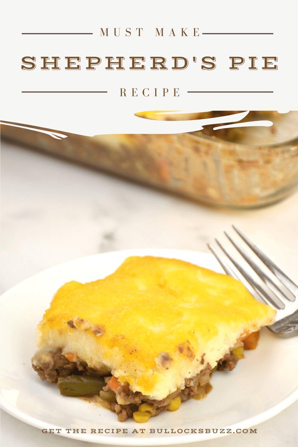 Slice of Shepherd's Pie on a plate with a fork