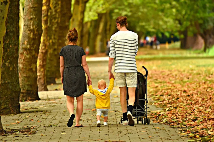 family walking in the park as a way to make your days run smoother