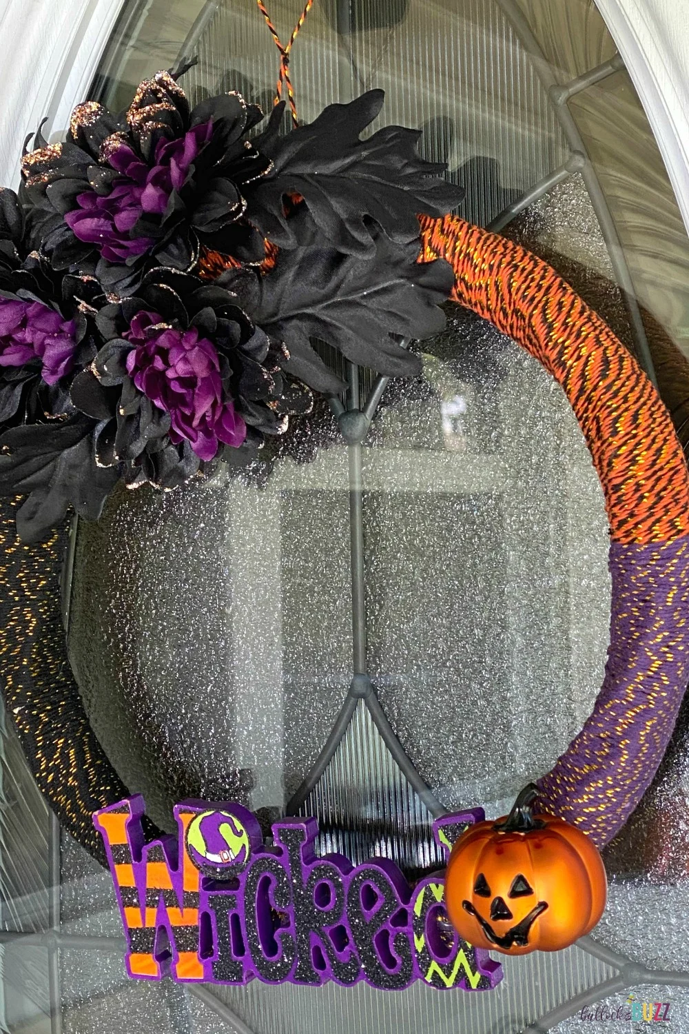 This DIY Halloween Wreath idea is so pretty and cute, your friends will be dying to know where you bought it!
