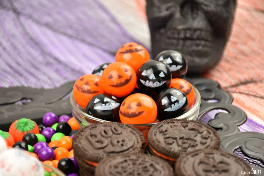 close up of cookies and gumballs on Halloween Candy Grazing Board