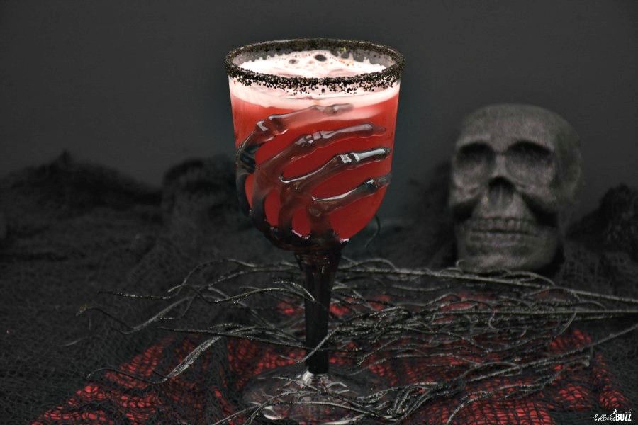 Vampire’s Kiss Halloween drink in skeleton hand glass