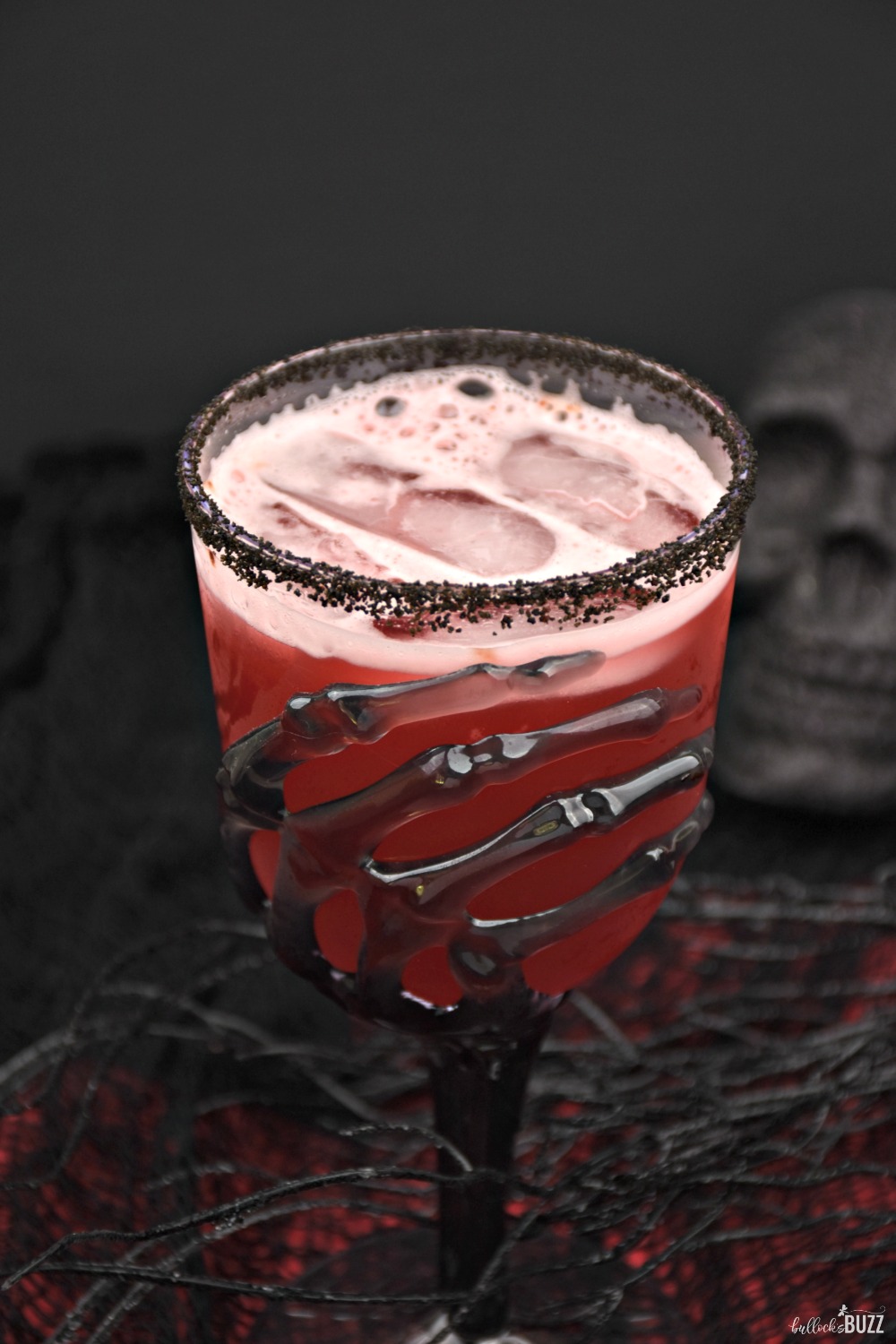 The Vampire's Kiss cocktail is an easy, red Halloween cocktail with a taste good enough to raise the undead!