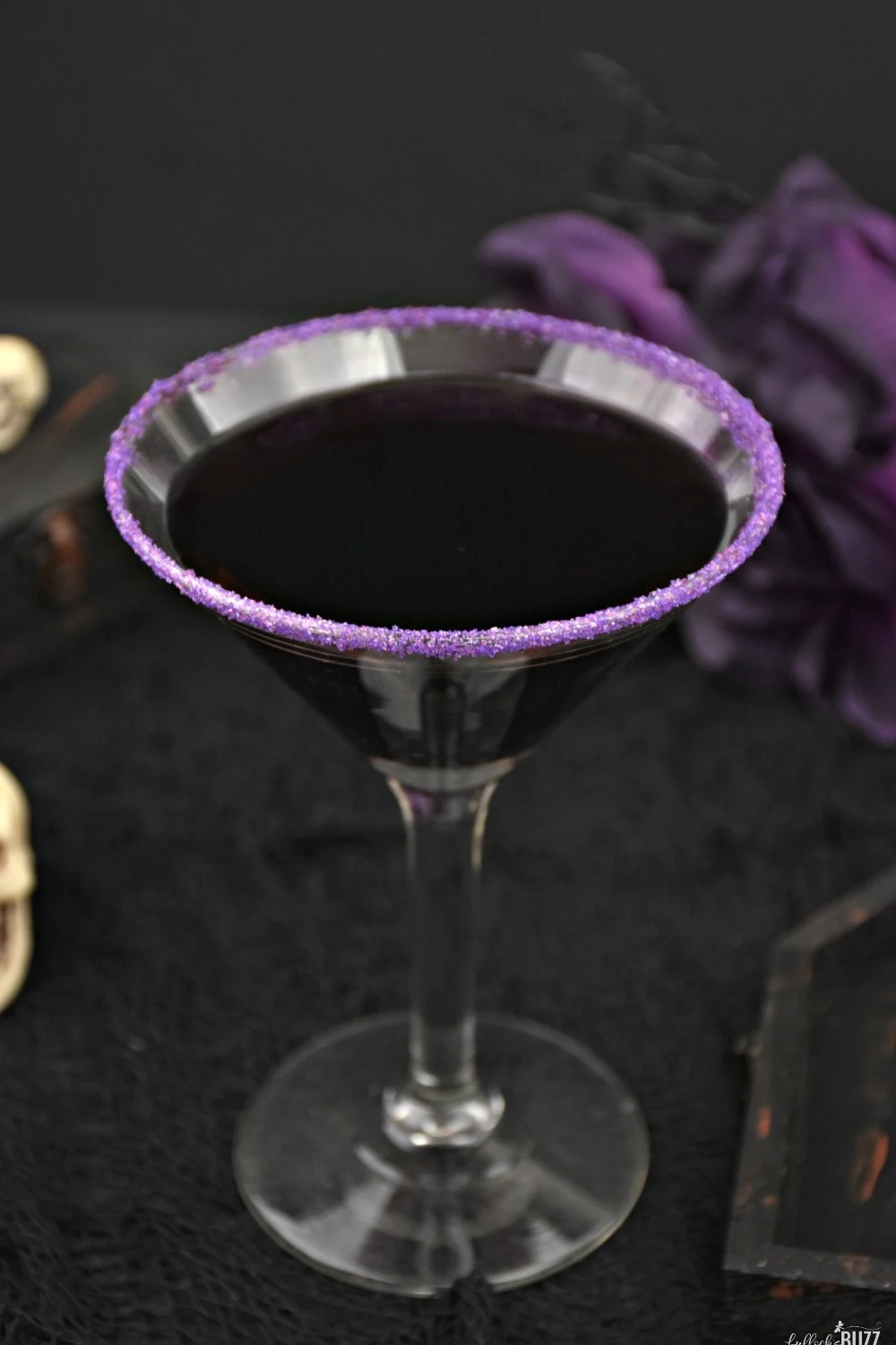 This simple Gravedigger boozy Halloween drink tastes of cranberries and rum - a deadly delicious combination. Get the Halloween cocktail recipe on the Bullock's Buzz blog!