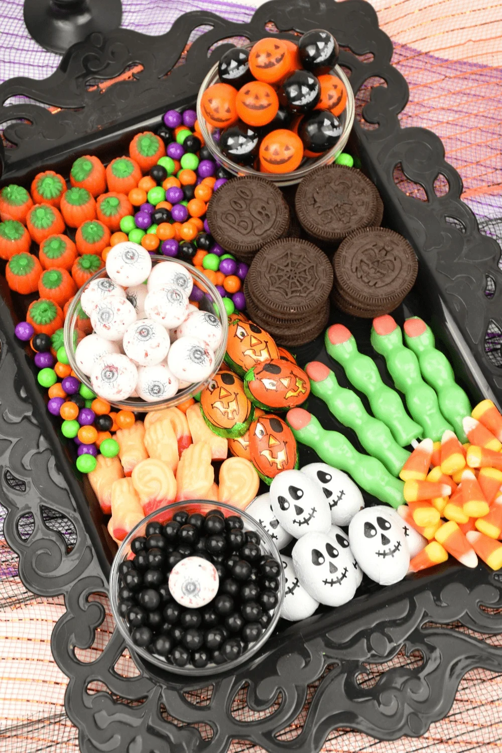Filled with a delicious selection of traditional Halloween sweets, this chillingly cute Halloween Candy Charcuterie Board is one of my favorite dessert charcuterie boards to make!