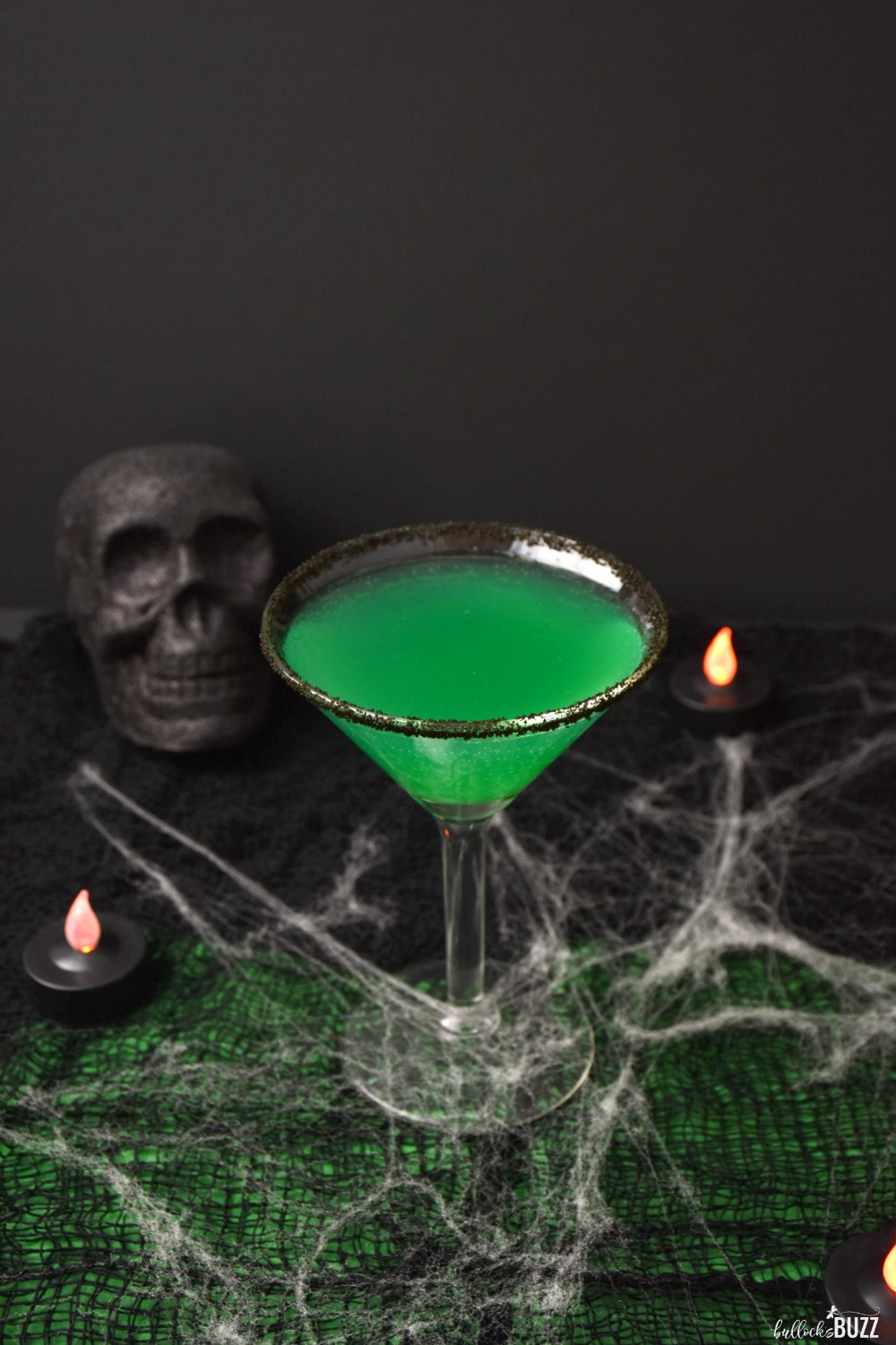 Scare up some adult fun on Halloween with this frightfully fruity Green Goblin Halloween Cocktail recipe! Get the recipe on the Bullock's Buzz blog!