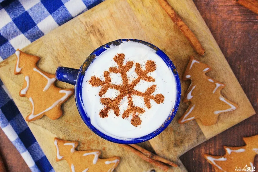 cinnamon snowflake topping on cup of vanilla spice eggnog
