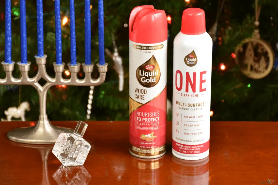 Ways to Get Your Home Holiday-Ready by dusting wood with Scott's Liquid Gold products including Wood Care and One Home Multi-surface Cleaner