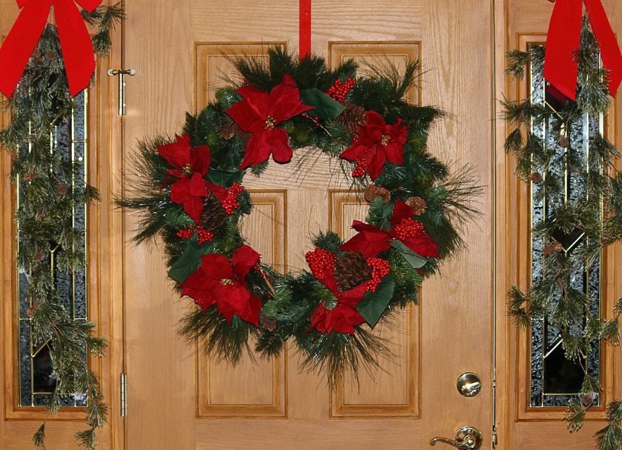 Ways to Get Your Home Holiday-Ready add decorations like this front door wreath