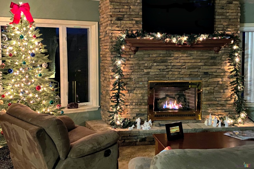 Ways to Get Your Home Holiday-Ready decorate your home with decor like this tree and fireplace mantle