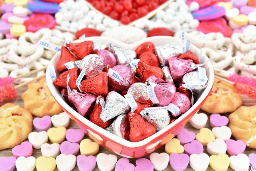 close up of Hershey's kisses in heart-shaped bowl on Valentines Charcuterie Tray