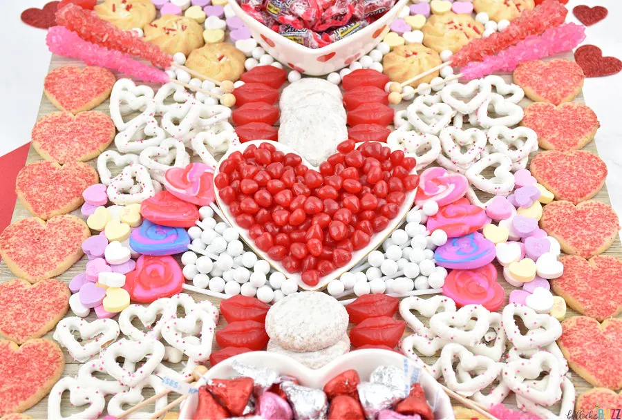 easy Valentine's Day Candy Charcuterie Board with cookies, candies, and more