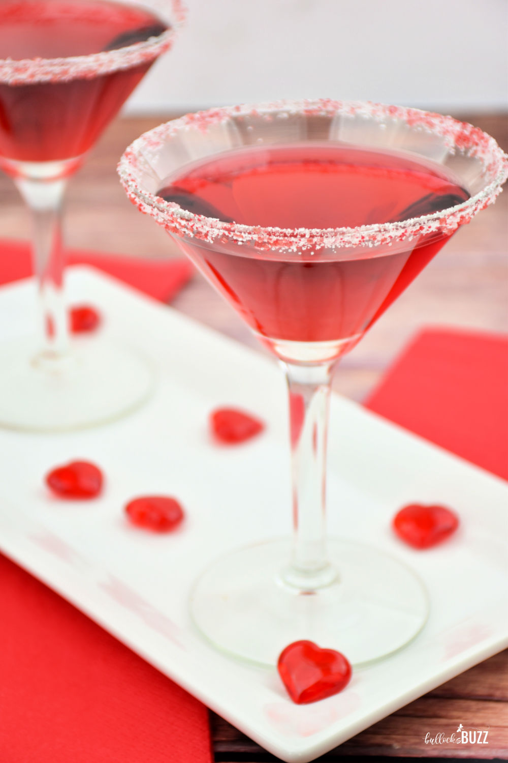 Ideal for a date night or a lonely heart's party, this red-hued libation with a sugar-coated rim makes for the perfect Valentine's Day cocktail!