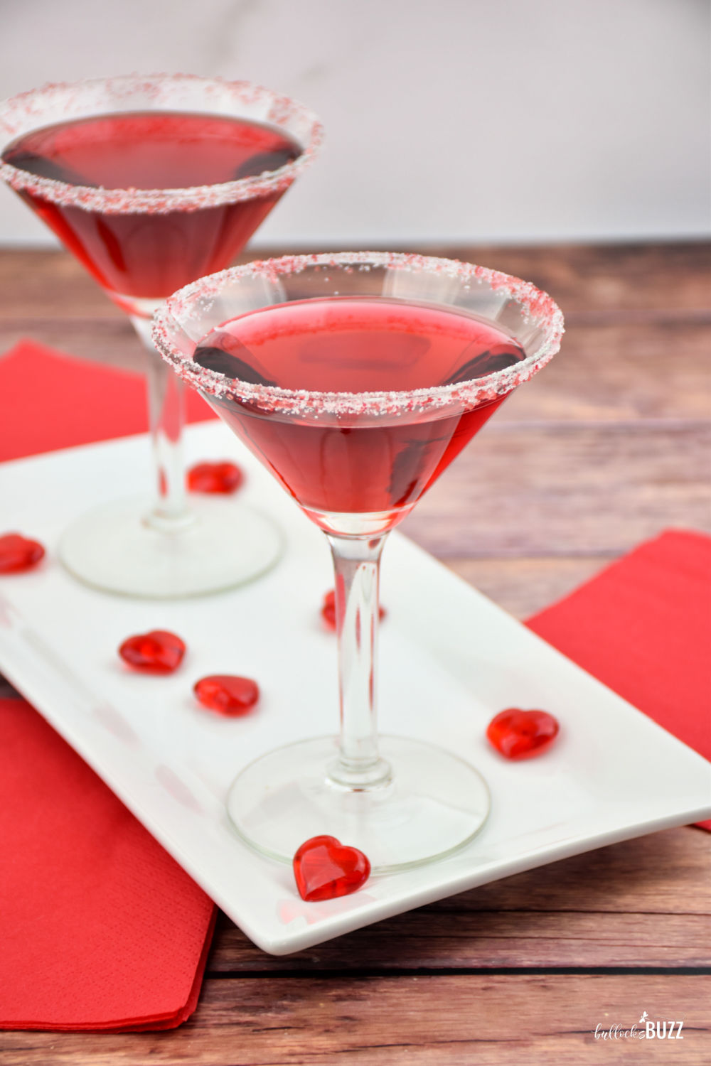 With its gorgeous red color and pleasantly sweet raspberry flavor, this fruity red Valentine's Day Cocktail is sure to win the heart of anyone who tries it!