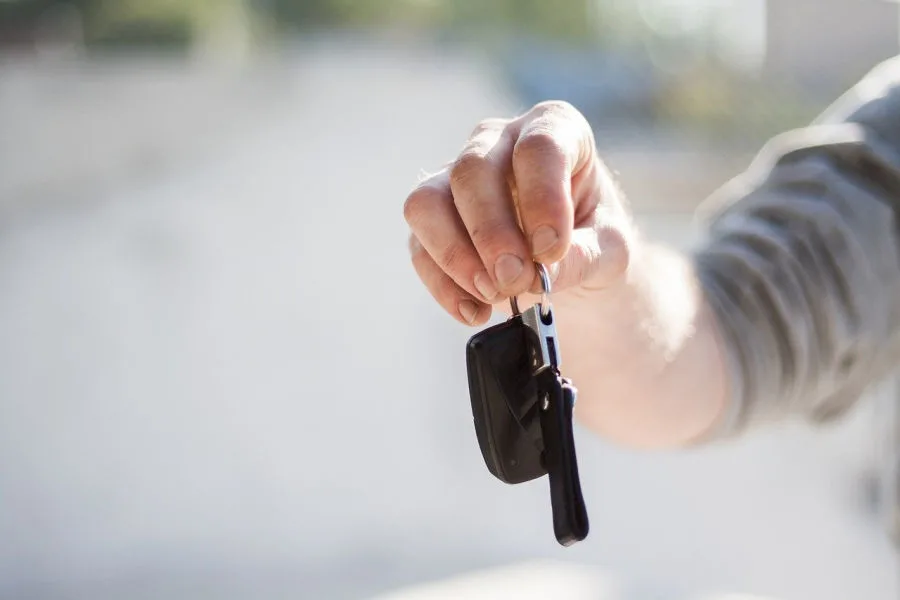 handing over the keys to the car