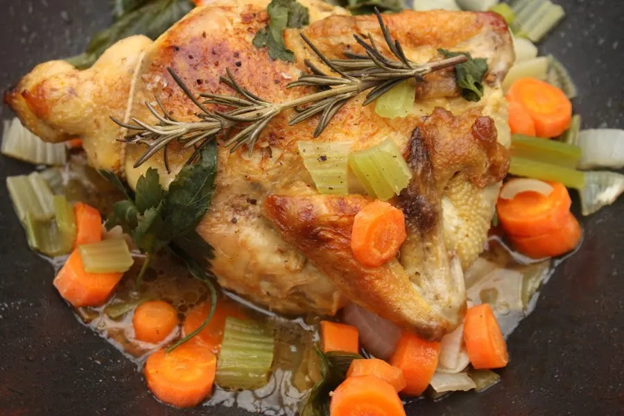 easy Roasted Chicken Dutch Oven Recipe finished in Dutch oven