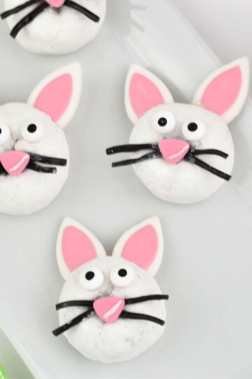 three Easter Bunny Donuts on white platter