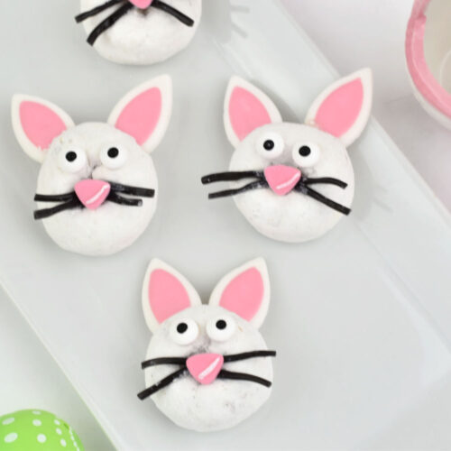 three Easter Bunny Donuts on white platter