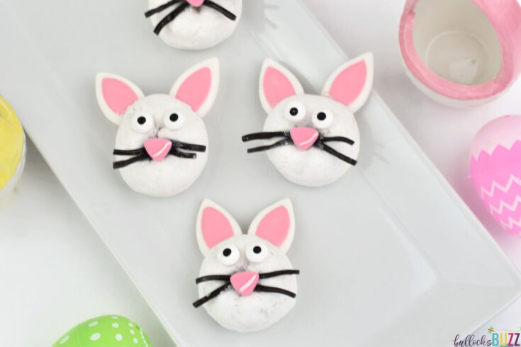 three Easter Bunny Donuts on white platter