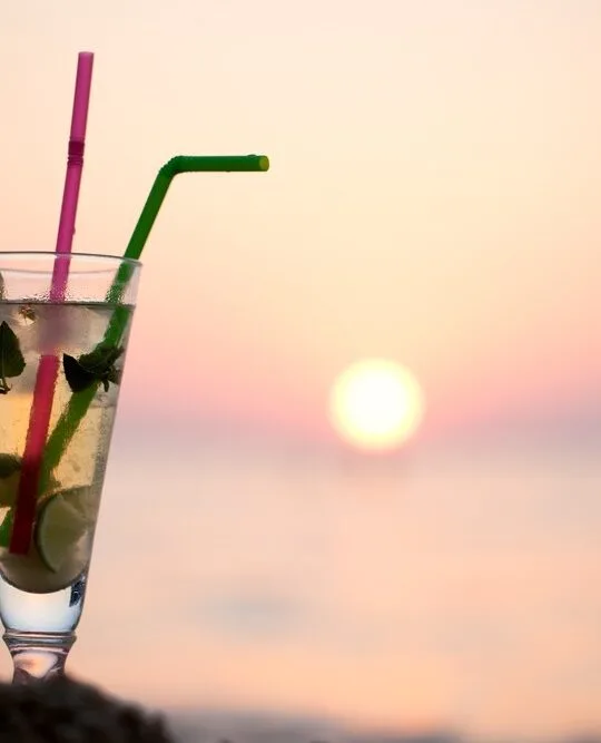Mojito mocktail on the beach at sunset