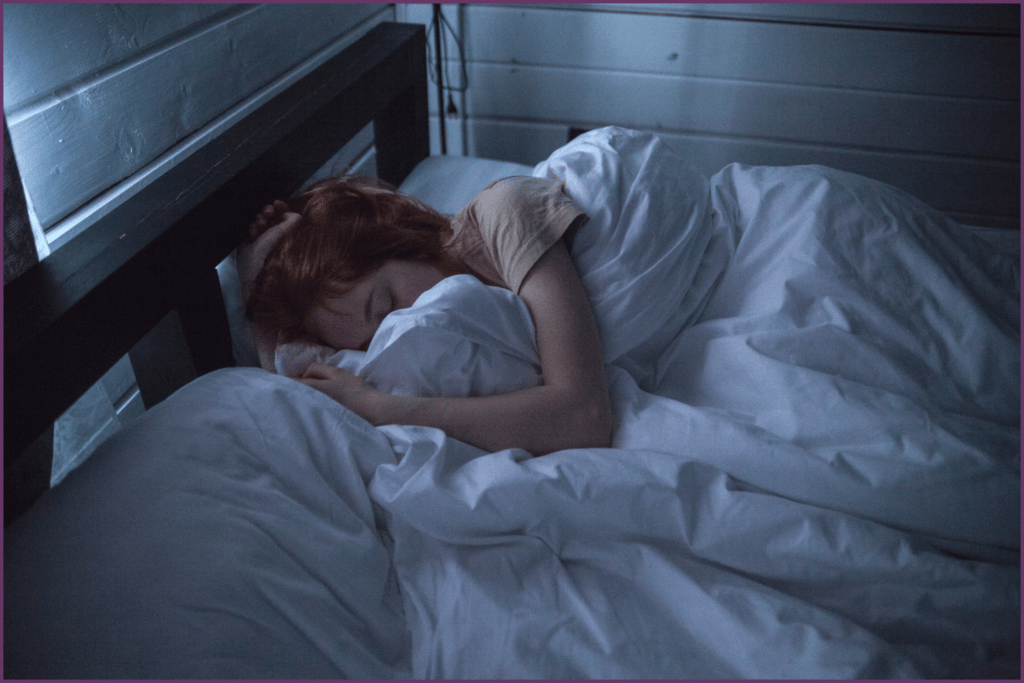woman alseep in bed and the benefit of sleep