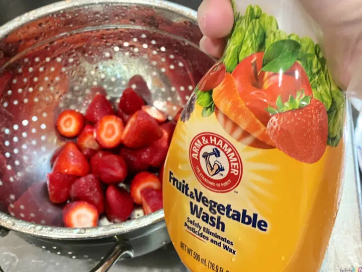 rinsing strawberries