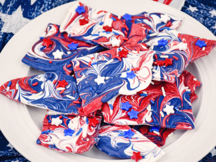 close up of red, white and blue candy with star shaped sprinkles