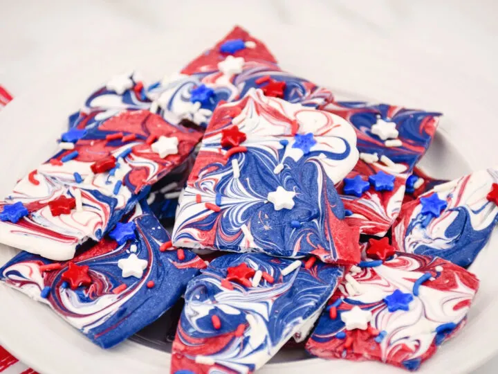 close up of red, white and blue candy on plate