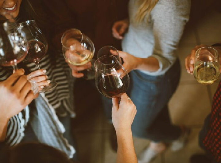 ladies toasting with wine glasses