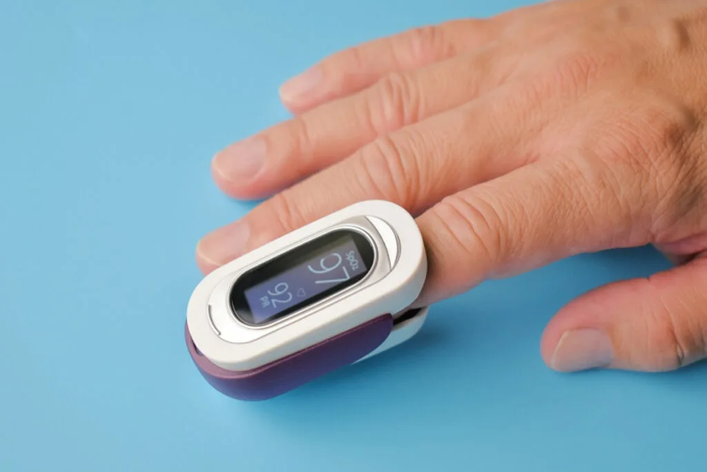 a pulse oximeter like this one is used to check your oxygen level at home