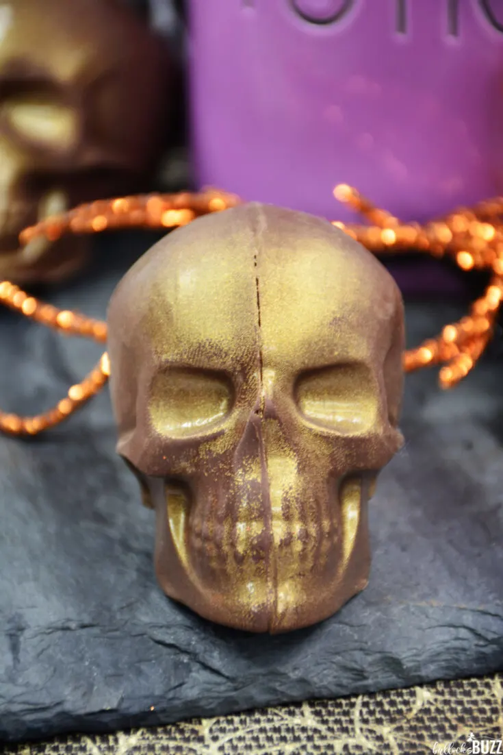 close up of gold Skull-Shaped Halloween Hot Cocoa Bomb