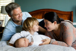 this family laughing together is one way to improve family communication