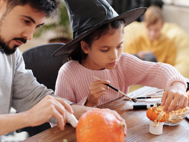  decorating pumpkins can be one of your new  Halloween traditions