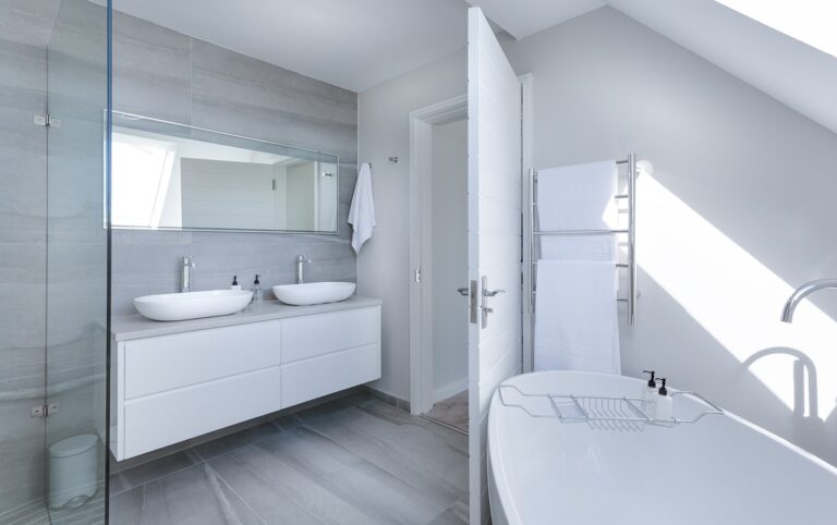luxurious bathroom with soaker tub and white marble
